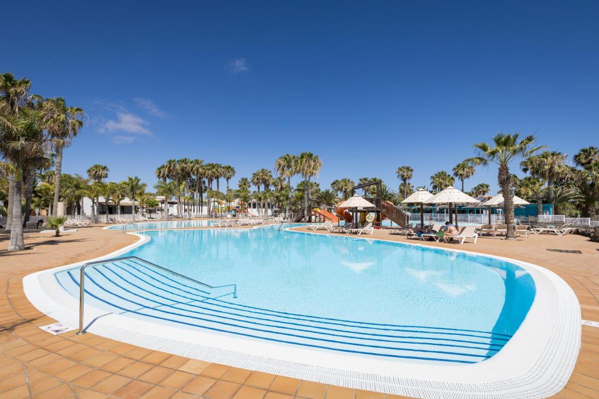 Corralejo Oasis Duna Casa 3P is Premium Adults-Only Apartment with Panoramic Pool View - Housity