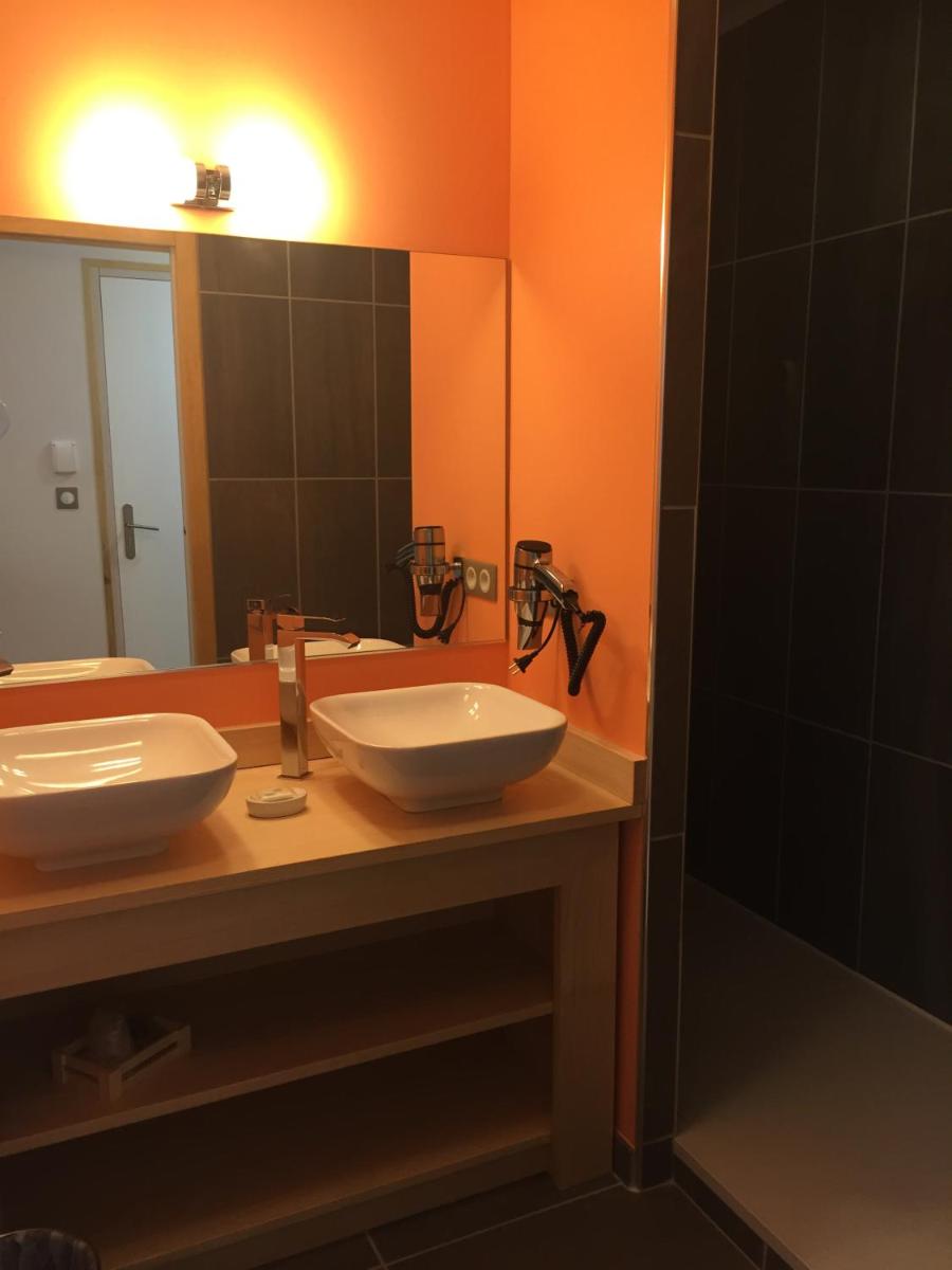 Salle de bains dans l'établissement Hôtel du Bout du Monde