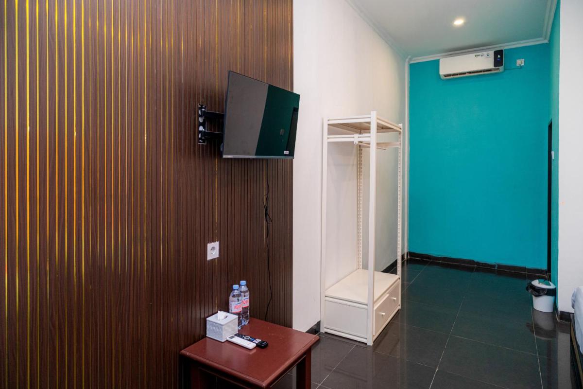 SANS Hotel Bobo Home Jambi - Housity