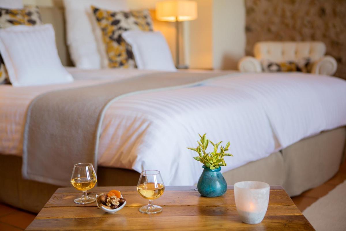 Cama o camas de una habitación en Casa Font i Roig