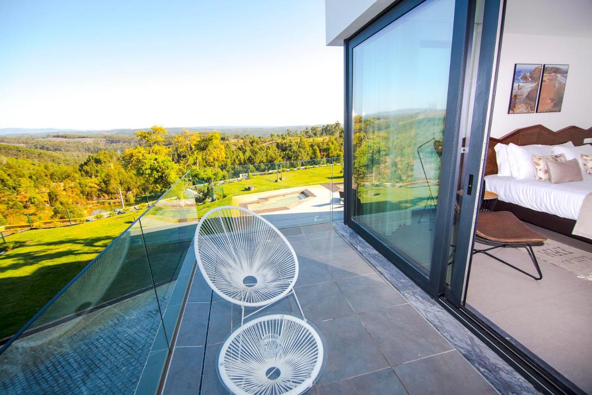 Uma varanda ou terraço em Enigma - Nature & Water Hotel