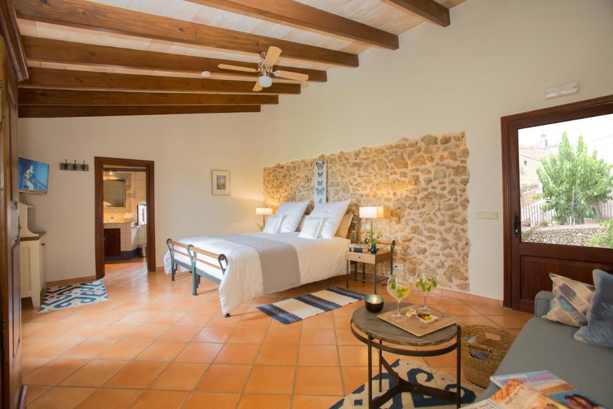 Cama o camas de una habitación en Casa Font i Roig