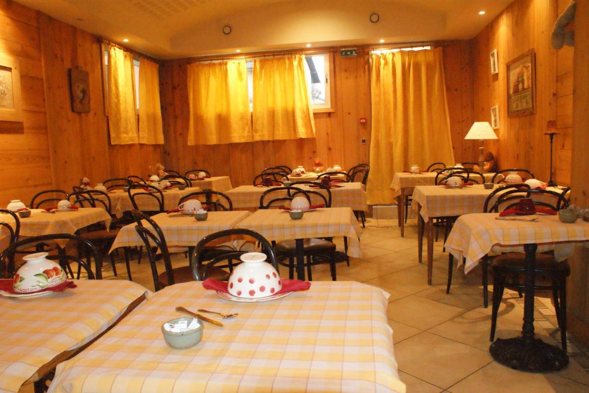 Restaurant ou autre lieu de restauration dans l'établissement Hotel Blanc