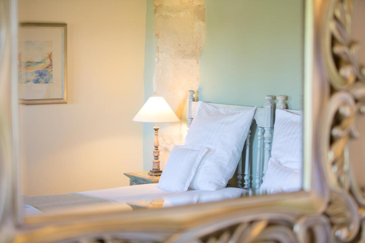 Cama o camas de una habitación en Casa Font i Roig