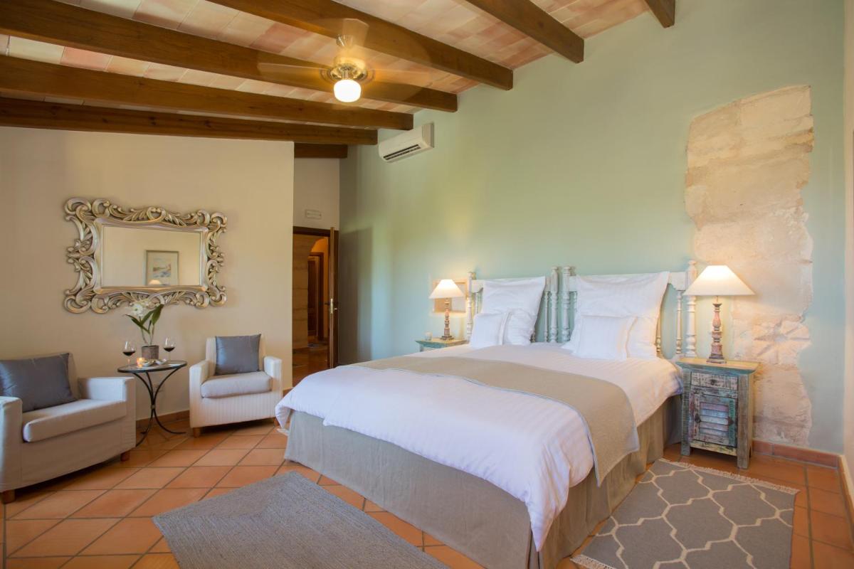 Cama o camas de una habitación en Casa Font i Roig