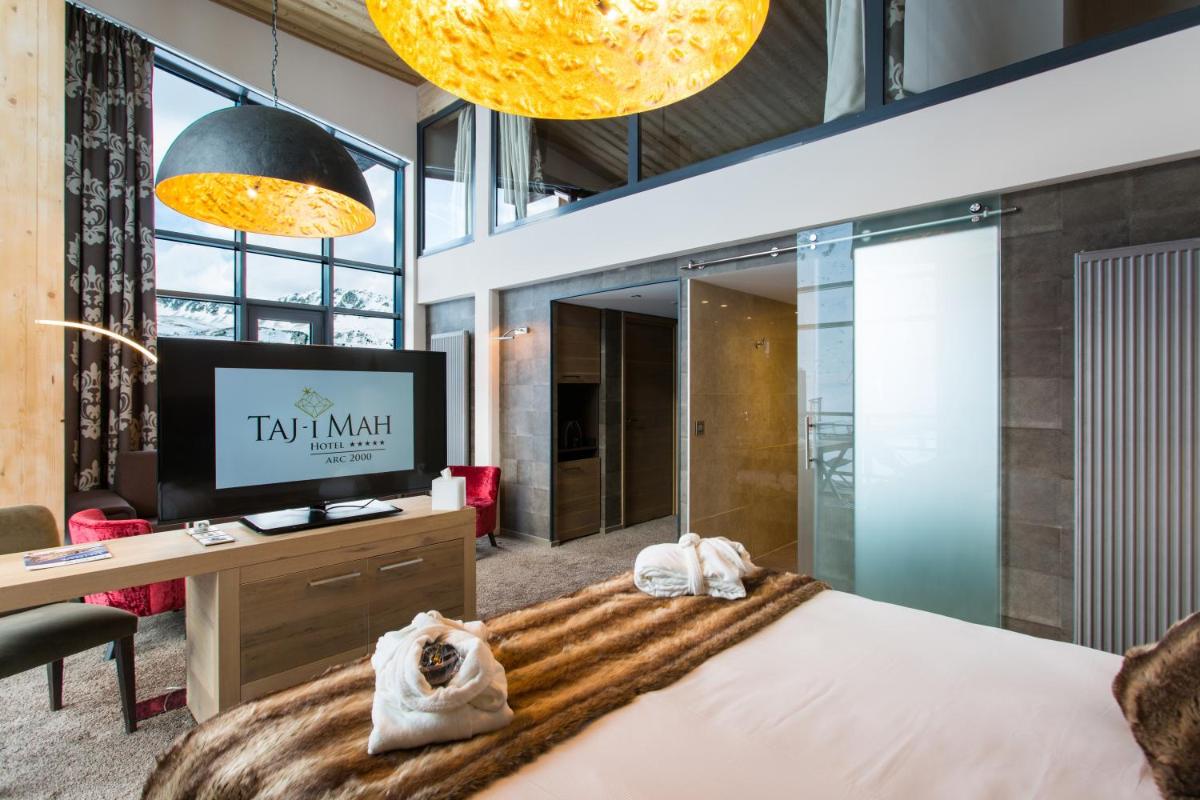 Un ou plusieurs lits dans un hébergement de l'établissement Hôtel Taj-I Mah by Les Etincelles