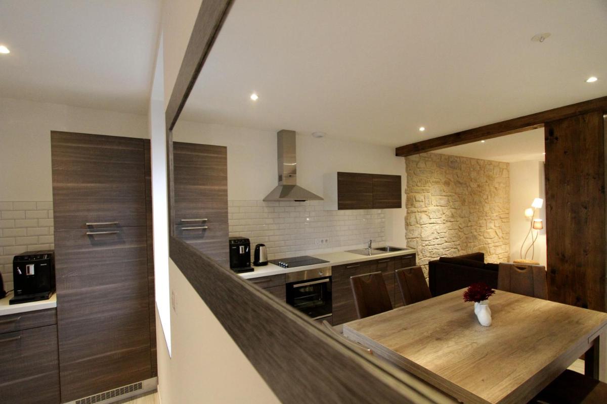 Cuisine ou kitchenette dans l'établissement Le Moulin d'Oscar & Spa - Mulhouse Nord