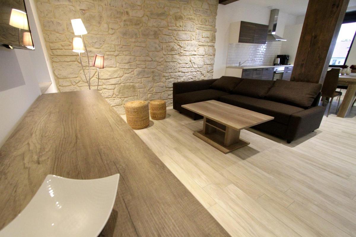 Coin salon dans l'établissement Le Moulin d'Oscar & Spa - Mulhouse Nord