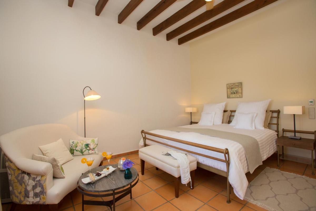 Cama o camas de una habitación en Casa Font i Roig
