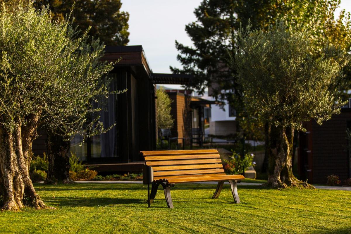 Um jardim no exterior de Prazer da Natureza Resort & Spa
