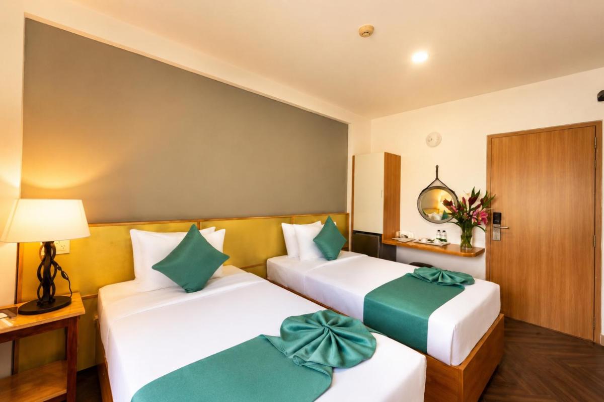 Happy Life Green Hotel - Housity