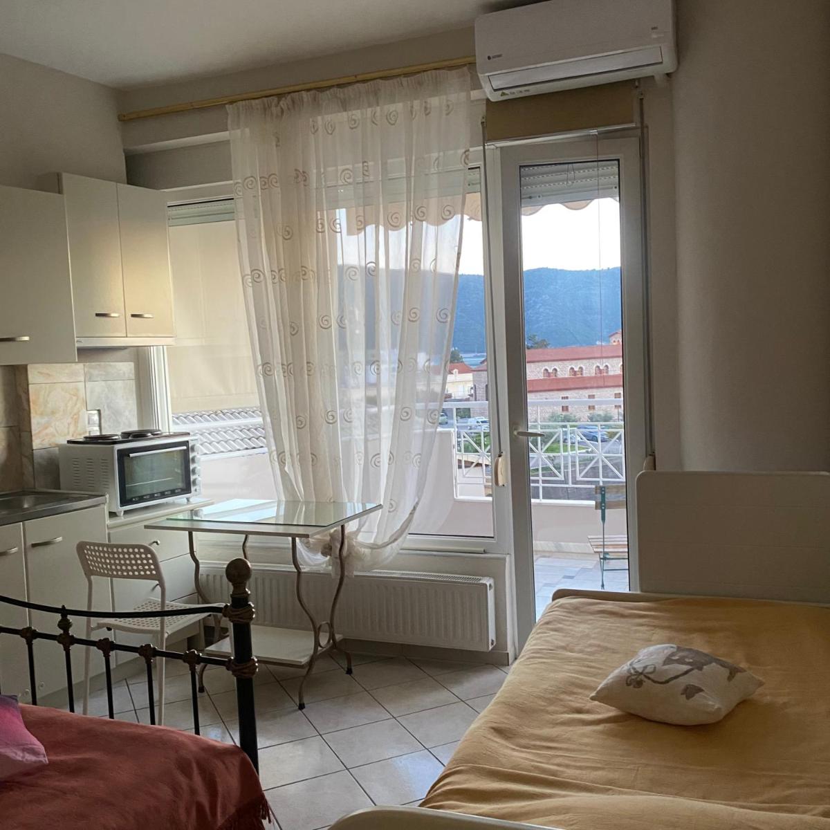 Marias rooms chantzara spyropoulos family apart 50 sqm 2studios sea view far 50 m harbour , heart city, flats to let - Housity
