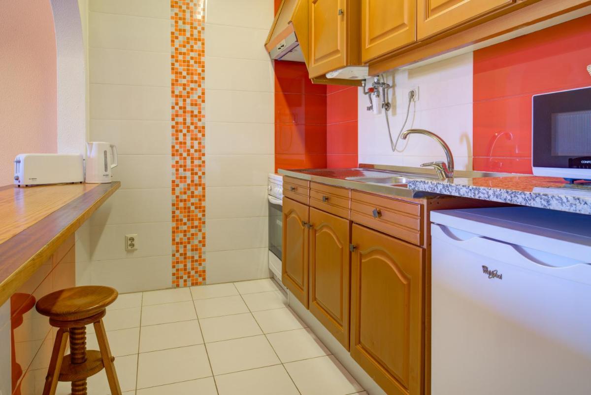 A cozinha ou kitchenette de Choromar Apartments