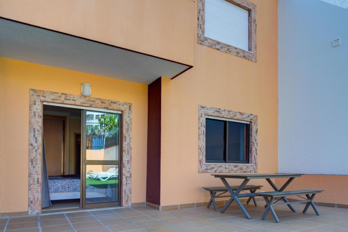 Um pátio ou outra área exterior em Choromar Apartments
