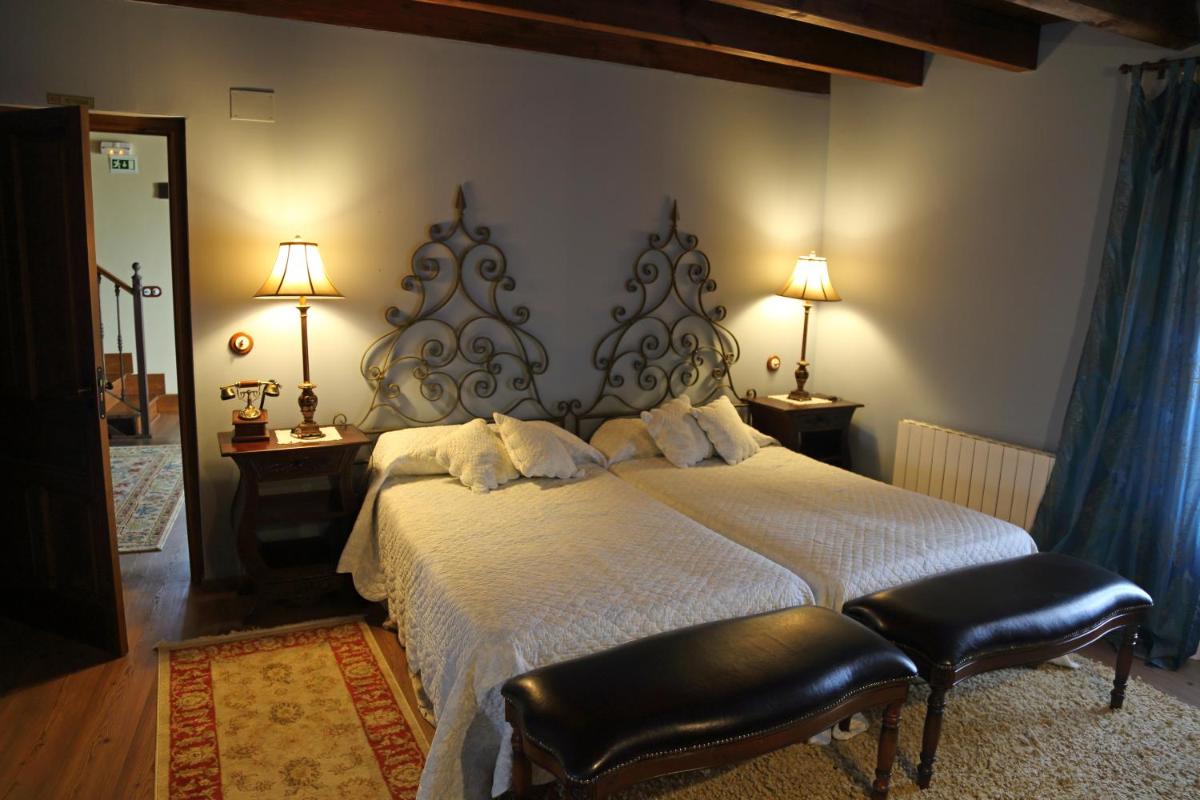 Cama o camas de una habitación en La Posada Del Canal
