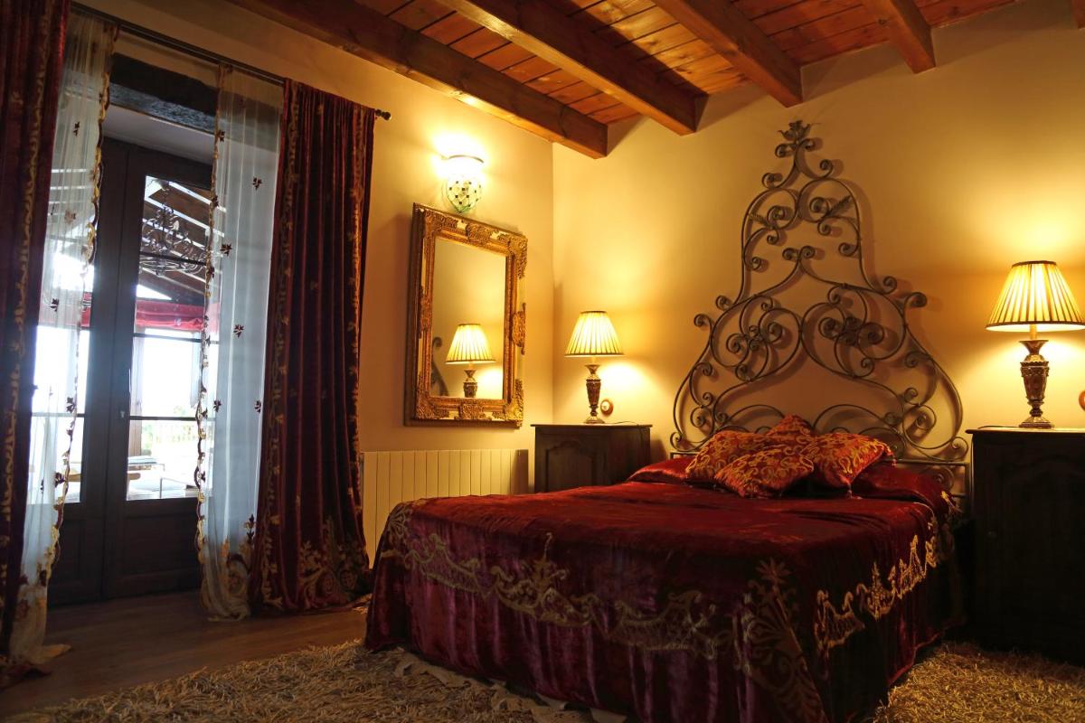 Cama o camas de una habitación en La Posada Del Canal