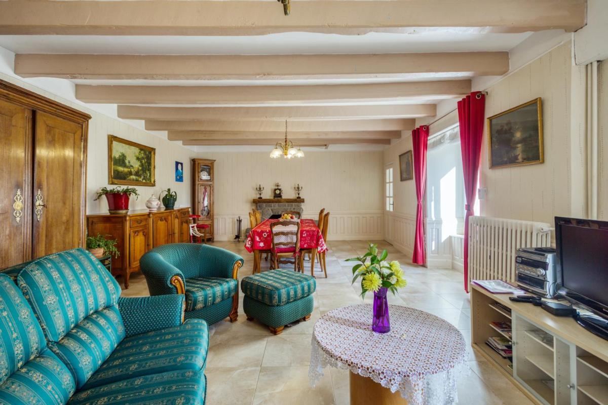 Maison chaleureuse à Pordic avec jardin et cheminée - Housity