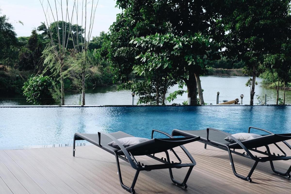 Riverawan Hotel - Housity