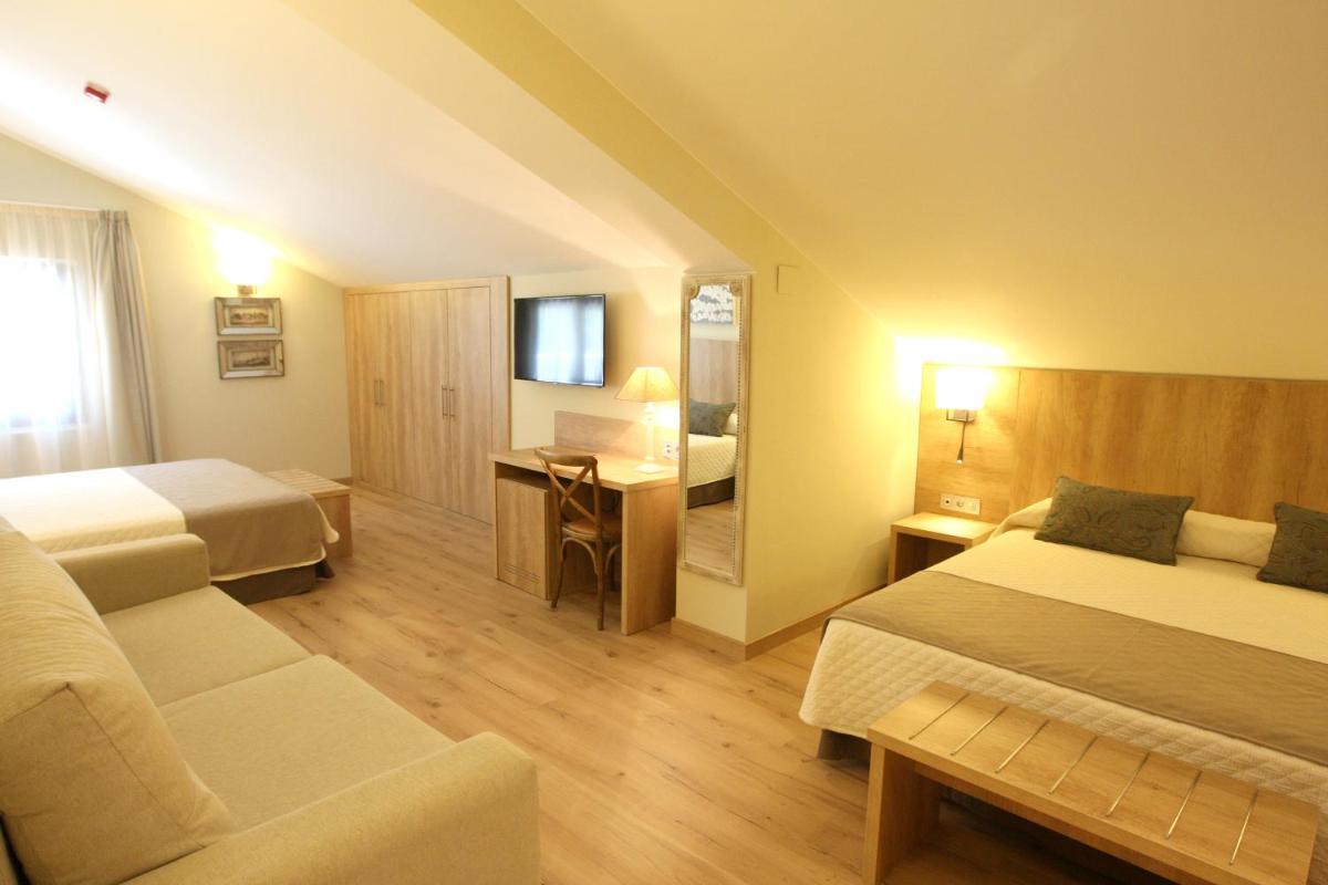 Cama o camas de una habitación en Hotel & Spa Real Villa Anayet