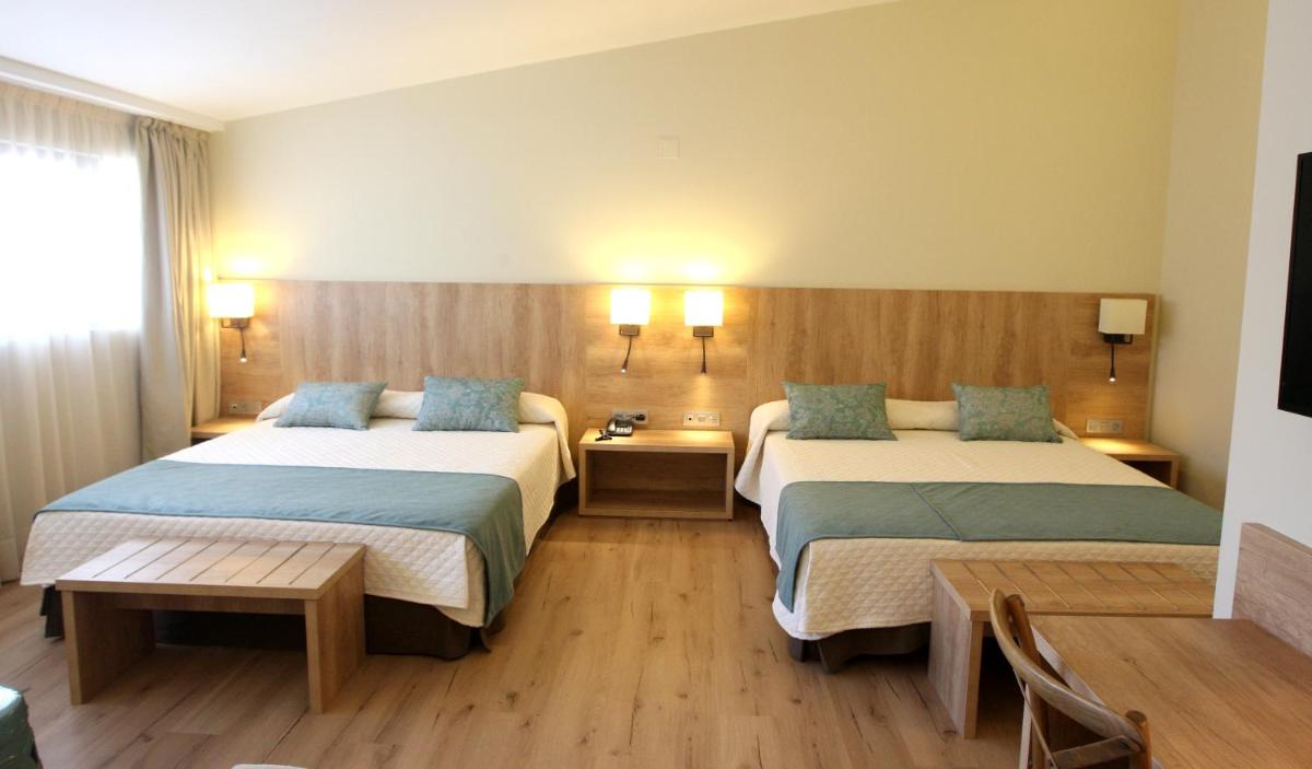 Cama o camas de una habitación en Hotel & Spa Real Villa Anayet