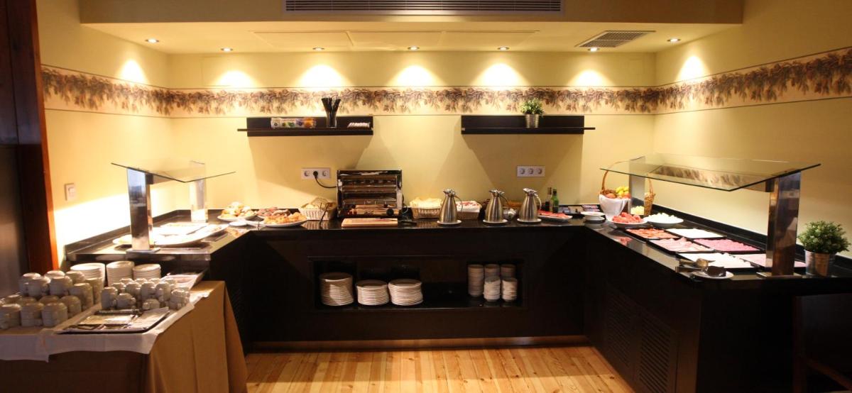 Una cocina o zona de cocina en Hotel & Spa Real Villa Anayet