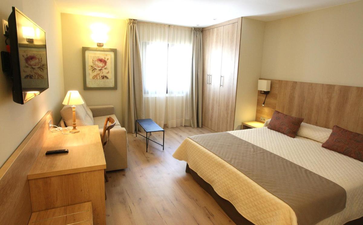 Cama o camas de una habitación en Hotel & Spa Real Villa Anayet