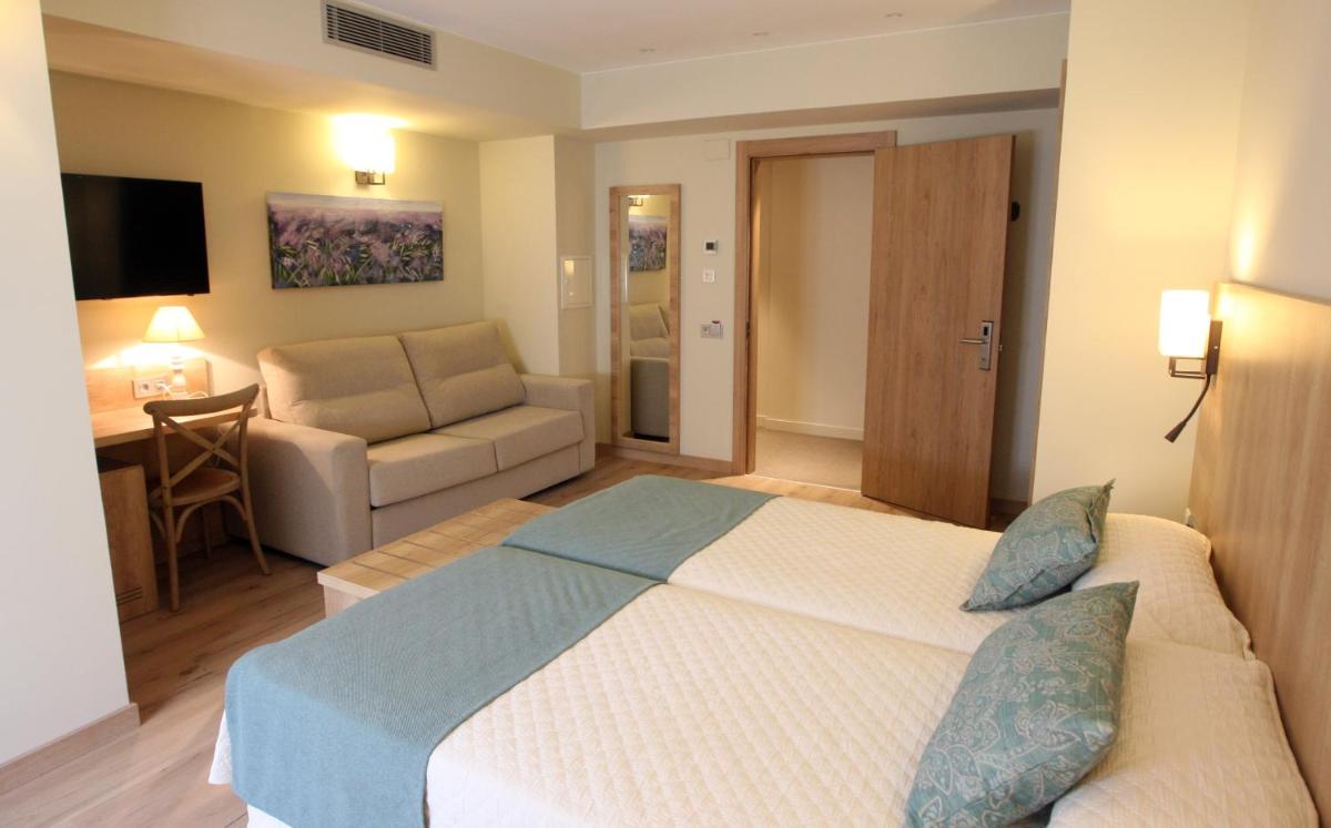 Cama o camas de una habitación en Hotel & Spa Real Villa Anayet