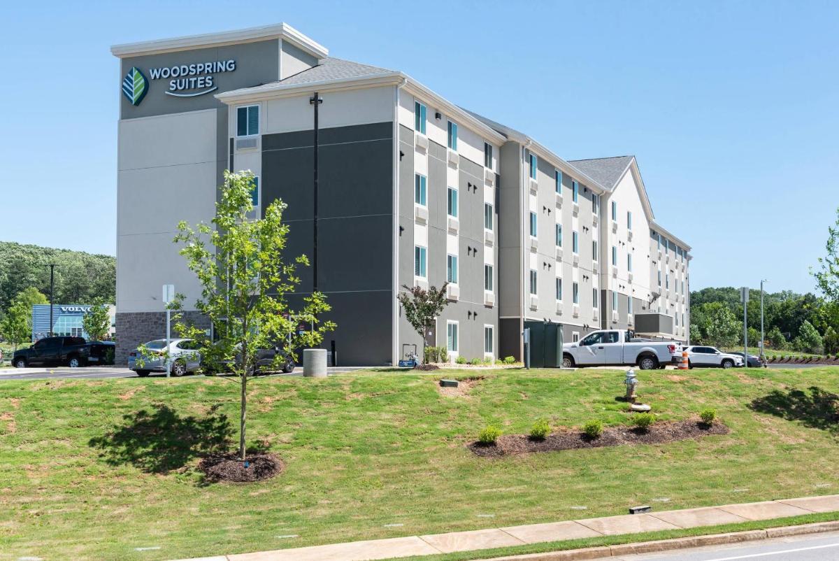 WoodSpring Suites Buford near Mall of Georgia-Lake Lanier - Housity