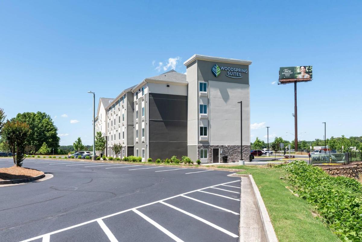 WoodSpring Suites Buford near Mall of Georgia-Lake Lanier - Housity