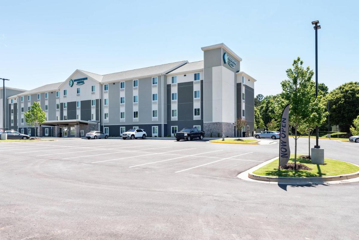 WoodSpring Suites Buford near Mall of Georgia-Lake Lanier - Housity