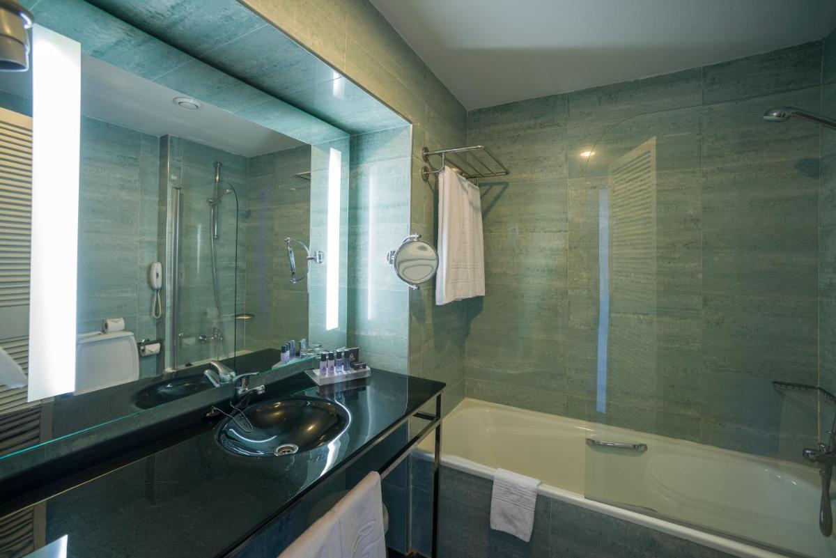 Uma casa de banho em Vila Gale Ampalius