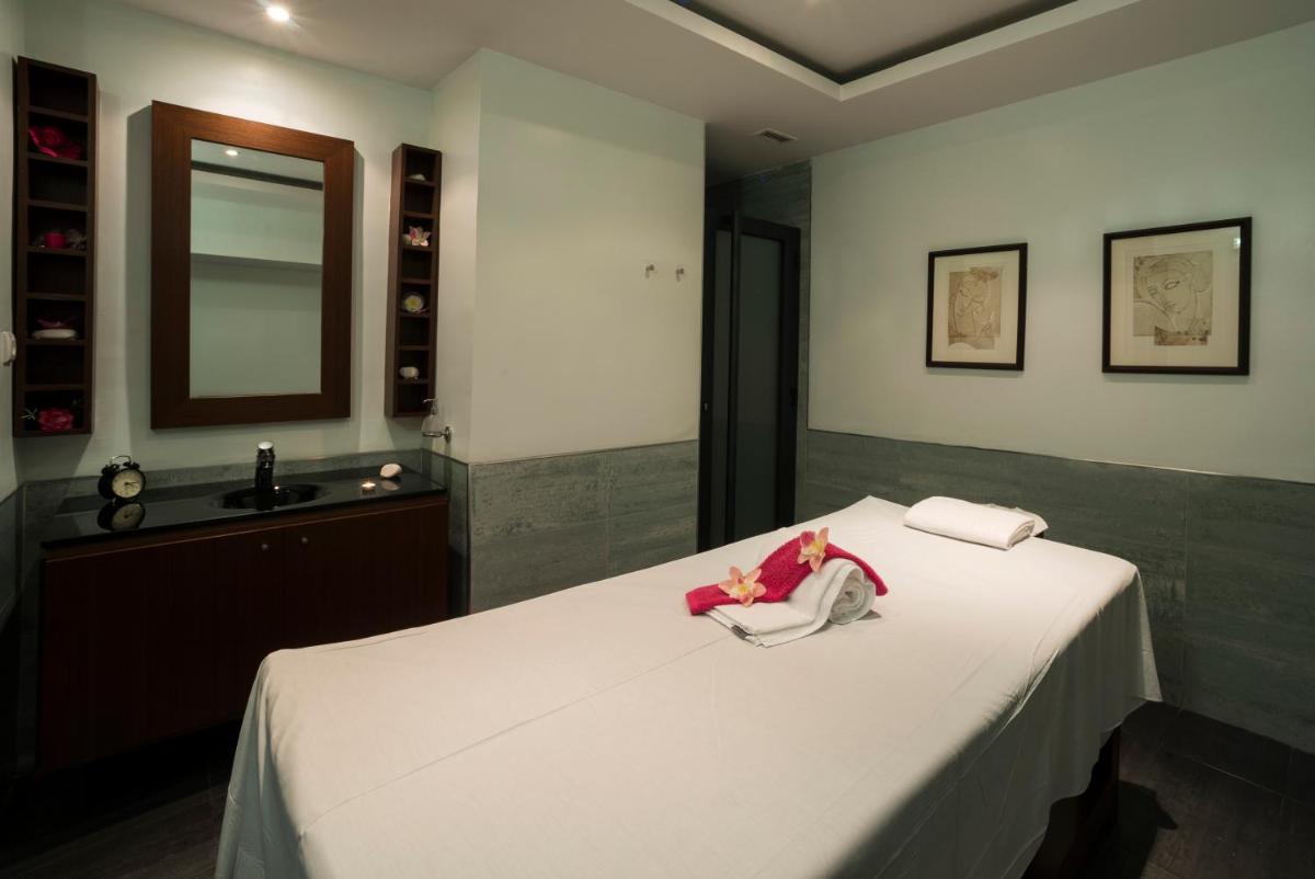 Uma cama ou camas num quarto em Vila Gale Ampalius