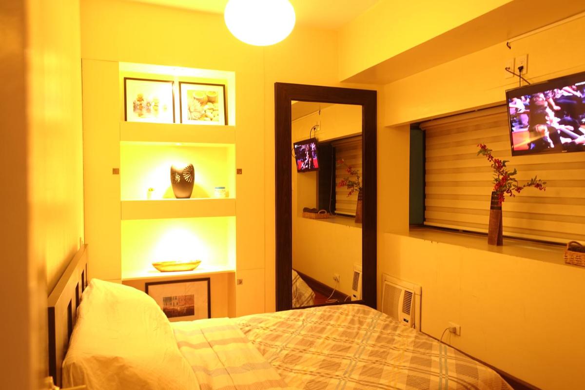 Modern Asian Condo at Forbeswood Parklane The Fort BGC - Housity