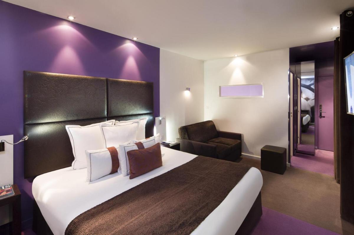Un ou plusieurs lits dans un hébergement de l'établissement Grand Hotel Saint Michel