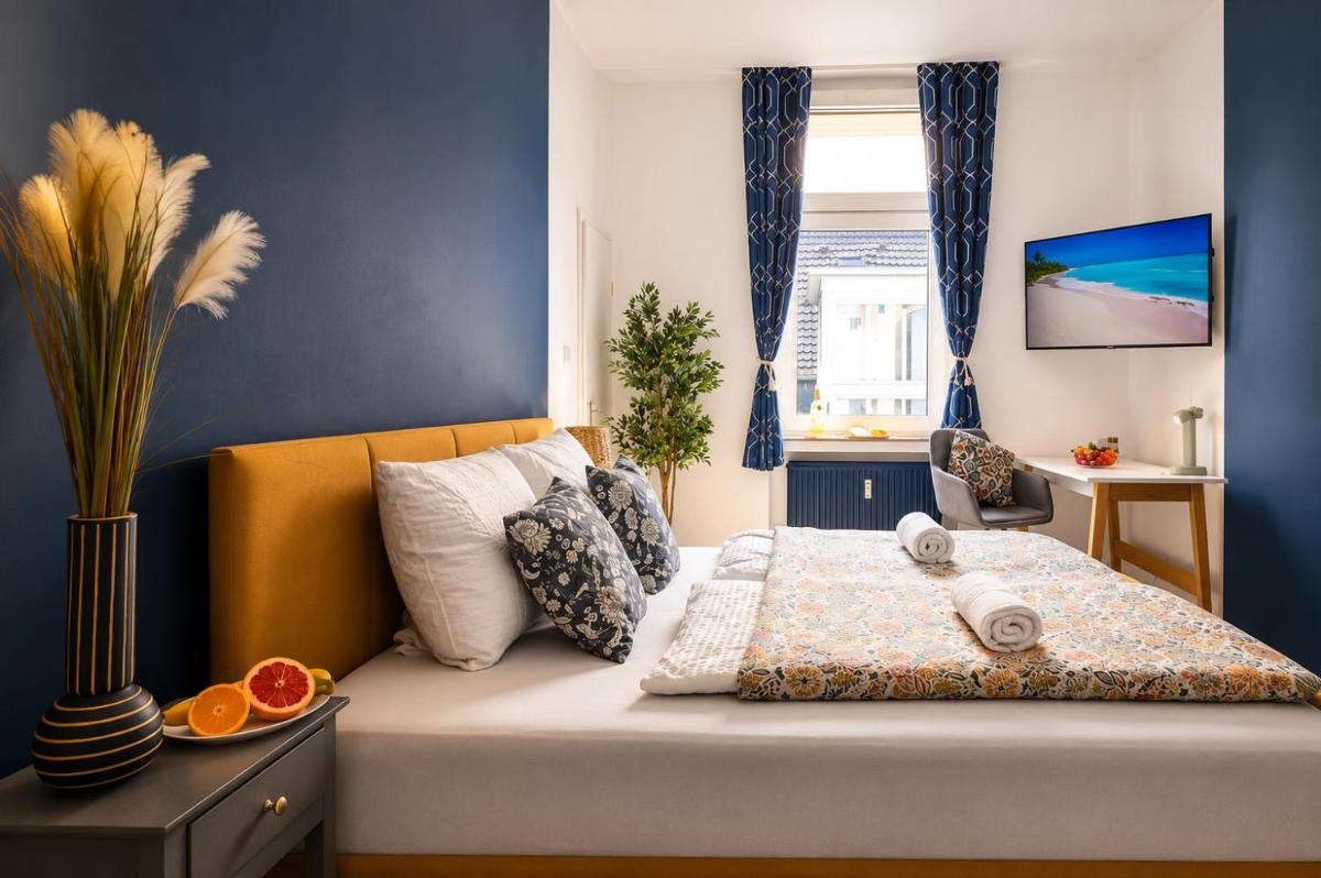 Gemütliche Zimmer im Herzen der Stadt EM-APARTMENTS DEUTSCHLAND - Housity