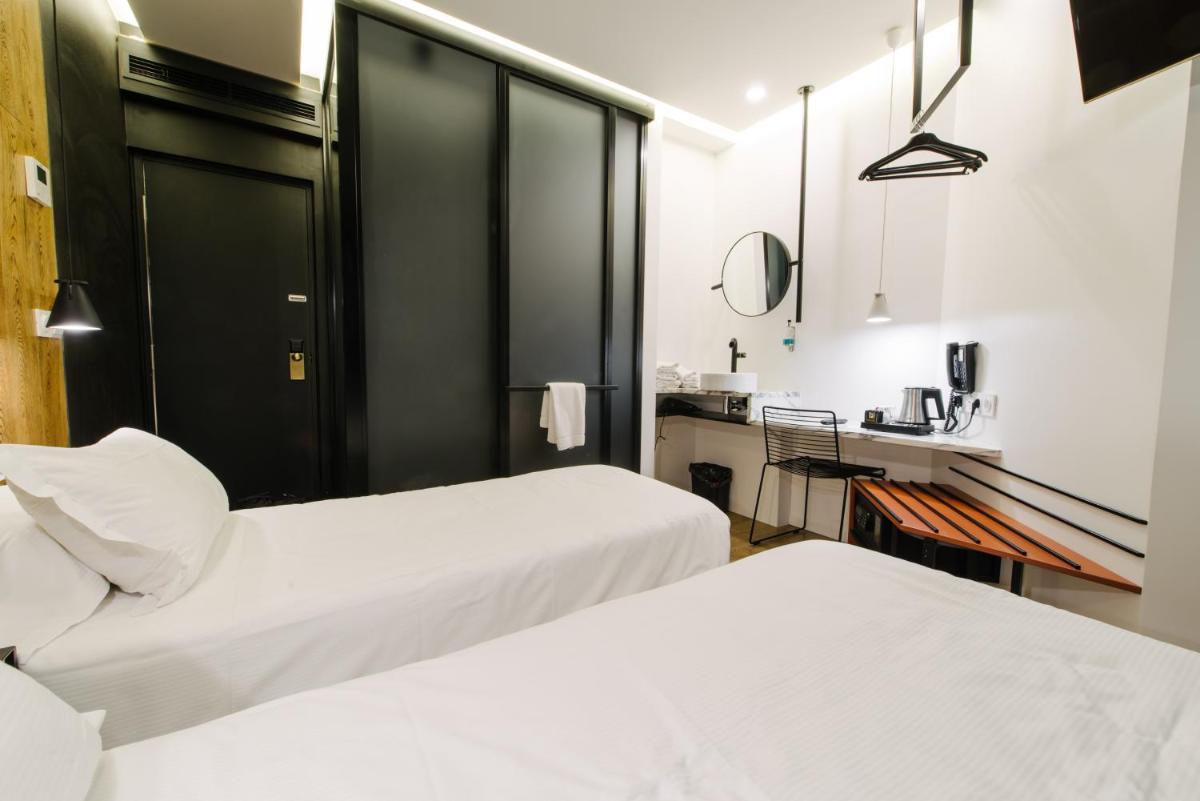 Un ou plusieurs lits dans un hébergement de l'établissement Atypik Hotel