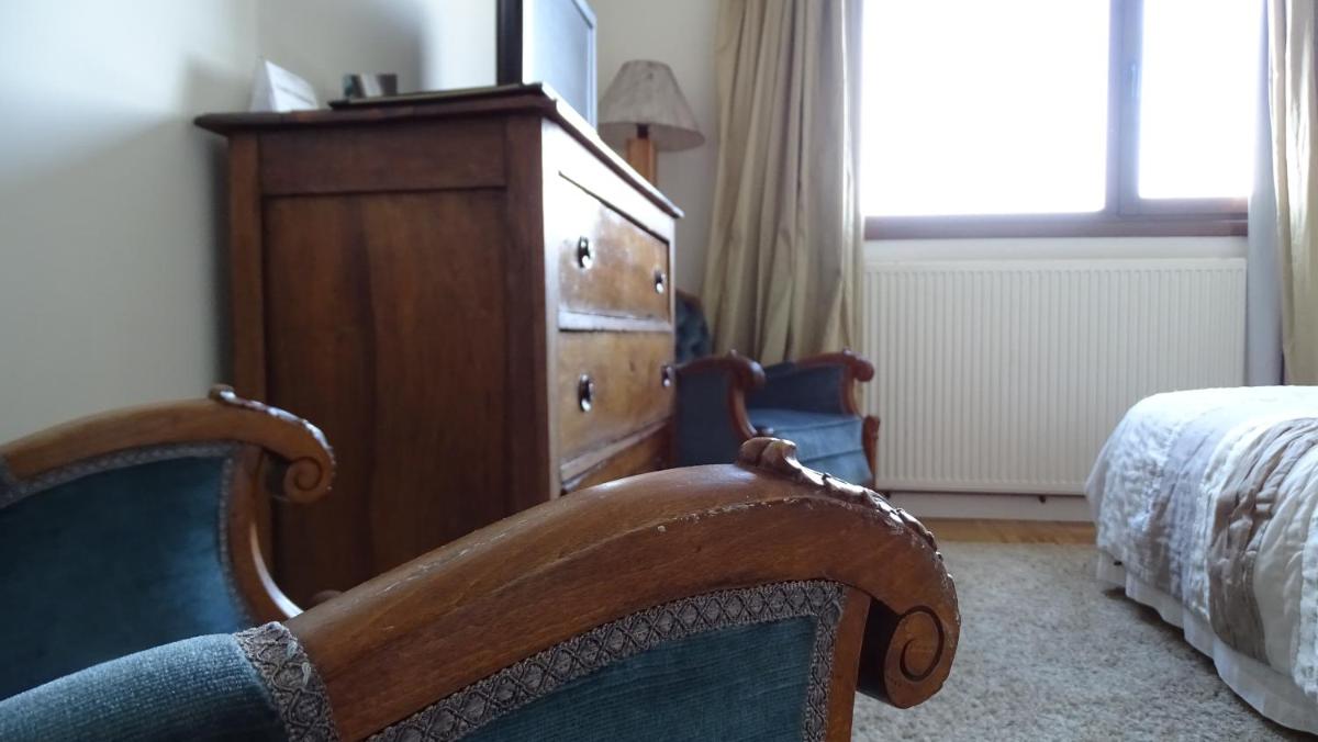 Cama o camas de una habitación en Hotel Cardamomo Sigüenza