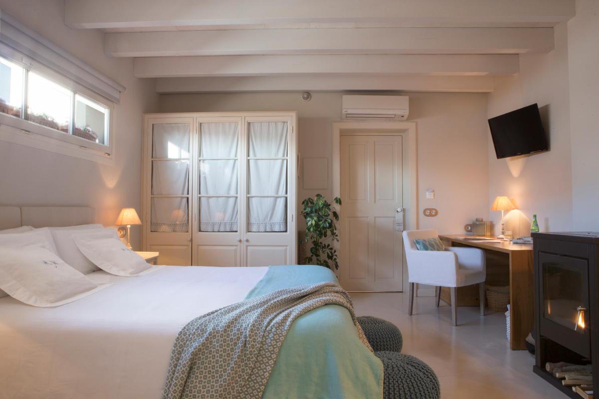 Cama o camas de una habitación en Jardí de Ses Bruixes Boutique Hotel