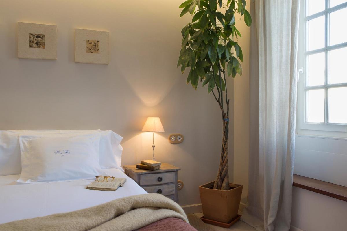 Cama o camas de una habitación en Jardí de Ses Bruixes Boutique Hotel