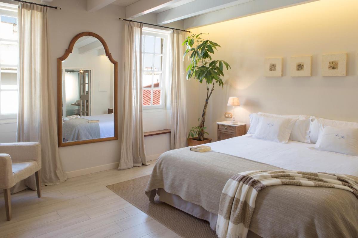 Cama o camas de una habitación en Jardí de Ses Bruixes Boutique Hotel