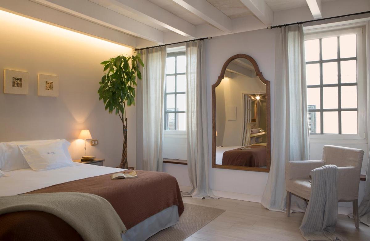 Cama o camas de una habitación en Jardí de Ses Bruixes Boutique Hotel