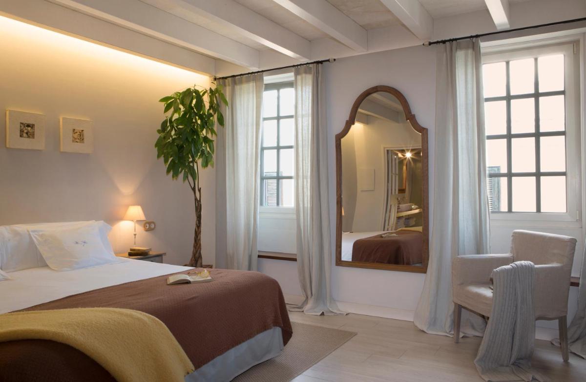 Cama o camas de una habitación en Jardí de Ses Bruixes Boutique Hotel