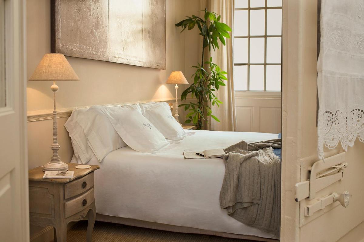 Cama o camas de una habitación en Jardí de Ses Bruixes Boutique Hotel