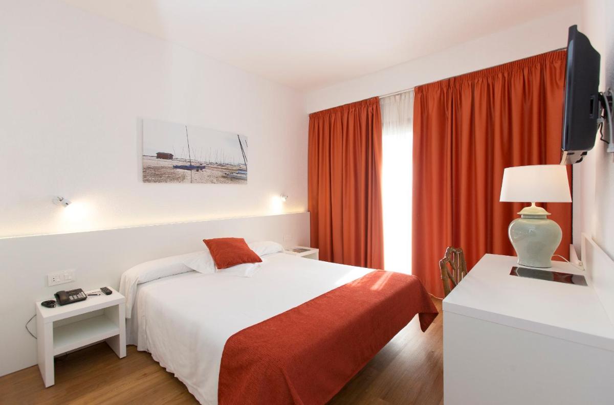 Cama o camas de una habitación en Intelier Orange