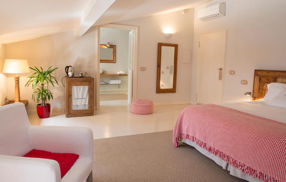 Cama o camas de una habitación en Jardí de Ses Bruixes Boutique Hotel