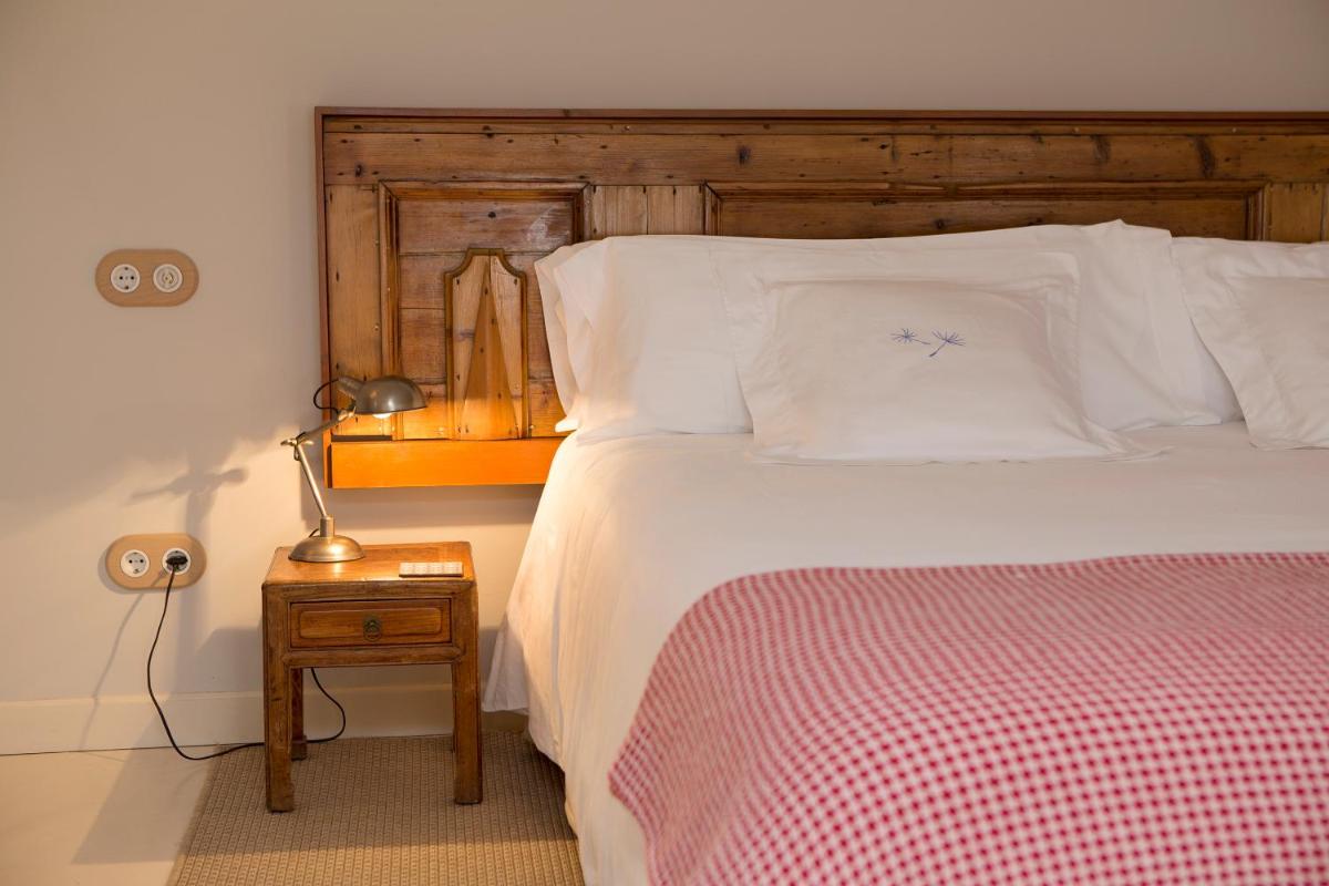 Cama o camas de una habitación en Jardí de Ses Bruixes Boutique Hotel