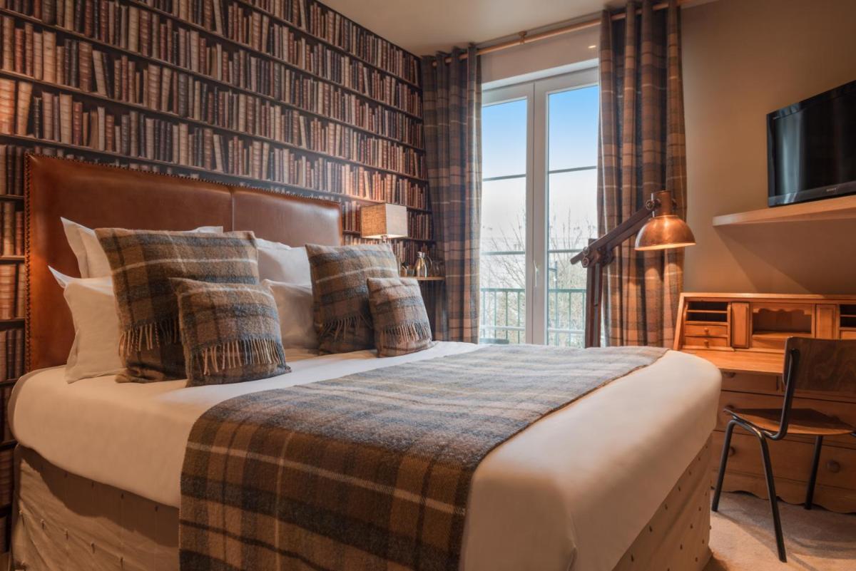 Un ou plusieurs lits dans un hébergement de l'établissement Hôtel Spa Vent d'Ouest