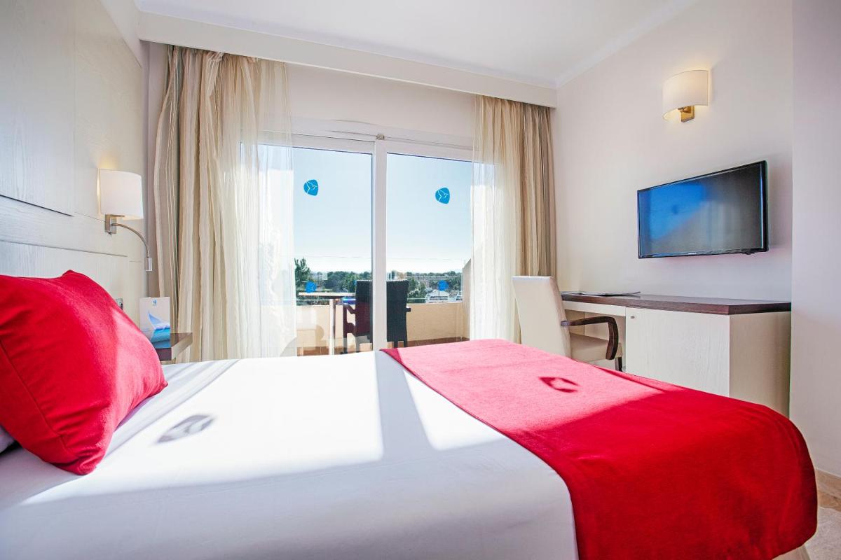 Cama o camas de una habitación en Grupotel Montecarlo