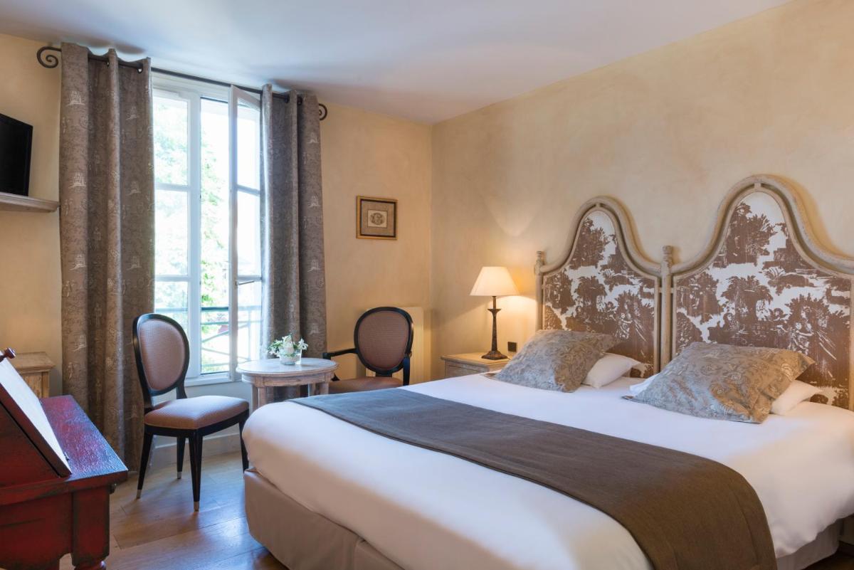 Hôtel Aux Vieux Remparts - Housity