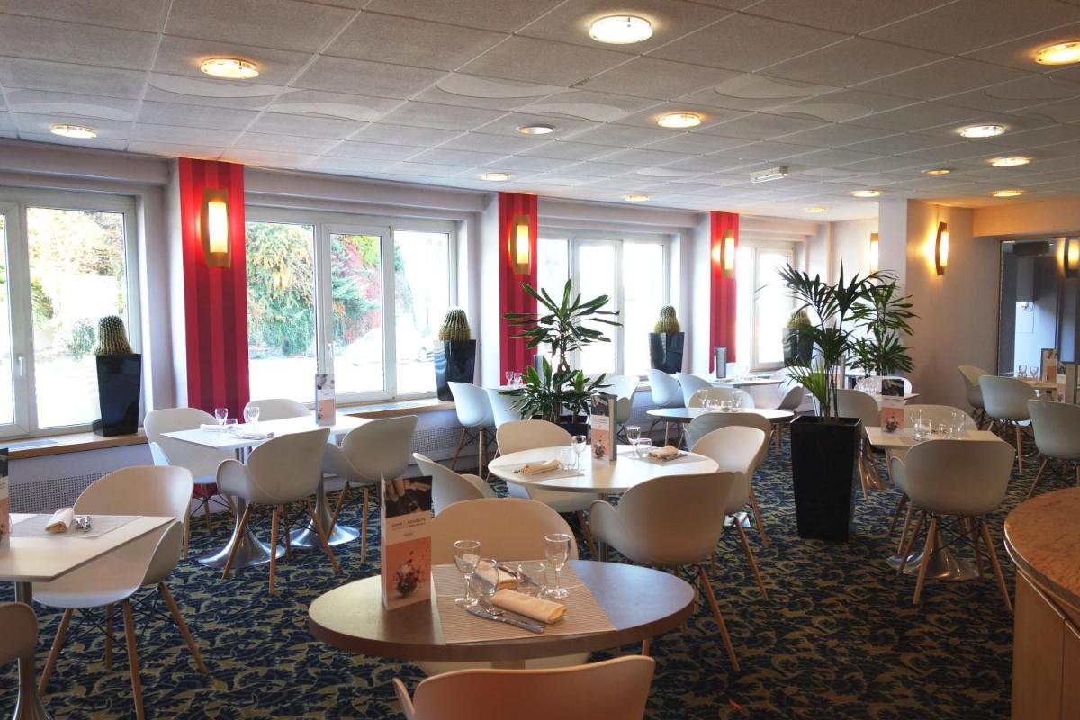 Restaurant ou autre lieu de restauration dans l'établissement Mercure Epinal Centre